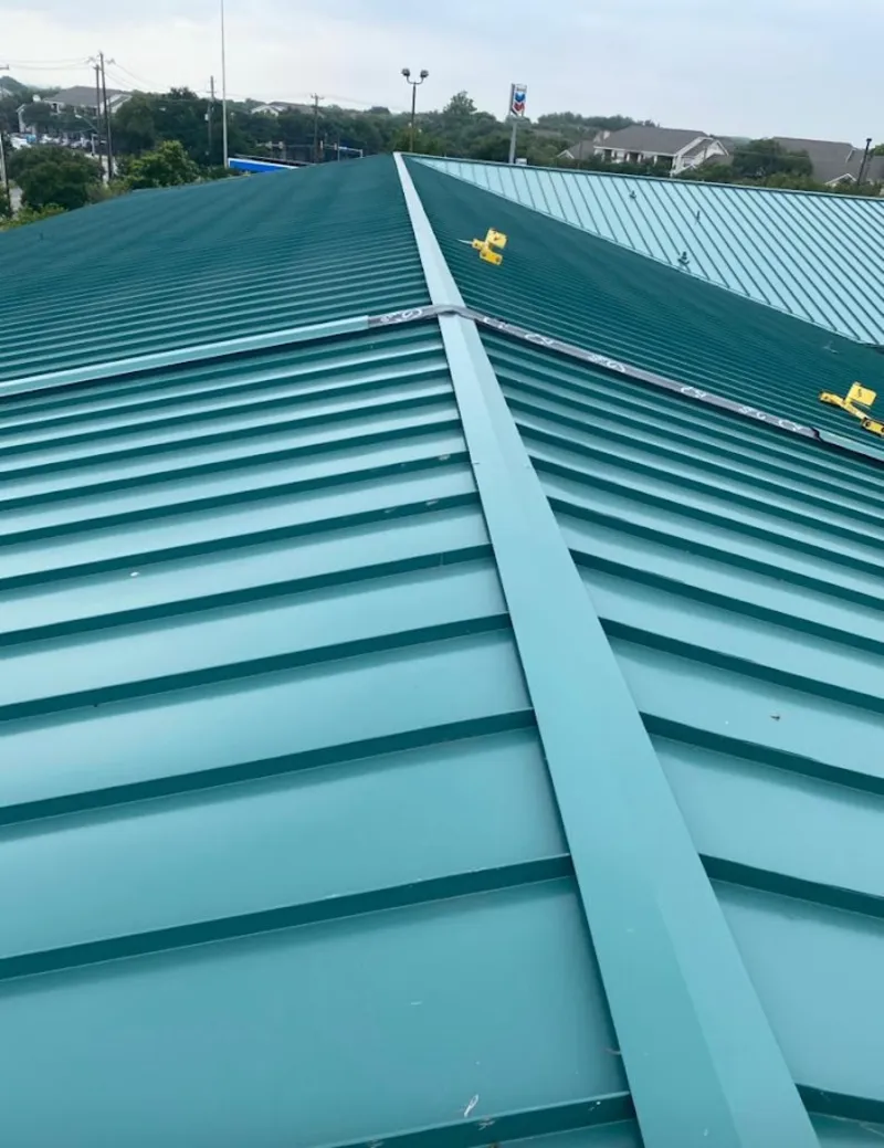 Green commercial metal roof ridge and valley for Metal Roof Repair in St. Pete Beach