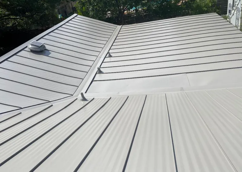 Solar attic fan installed on a metal roof for Roof Ventilation in St. Pete Beach